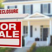 Buying homes in foreclosure: tax issues to consider